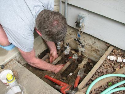 Hayward sprinkler repair technician replaces rusty falves